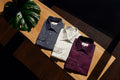 Classic men's dress shirts in navy, white and burgundy